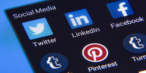 Social media apps on a mobile screen. Picture shows LinkedIn, the old Twitter sign, Pinterest and Tumblr.