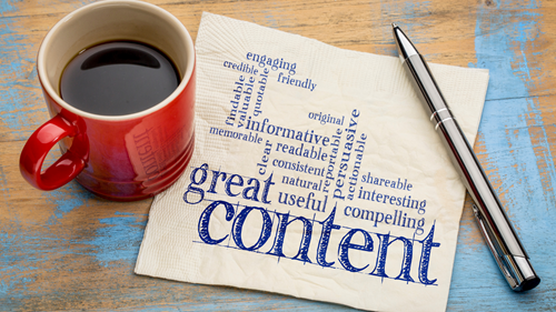 Napkin and pen. On the napkin it says 'great content.'