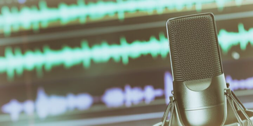 Microphone with digital screen behind.