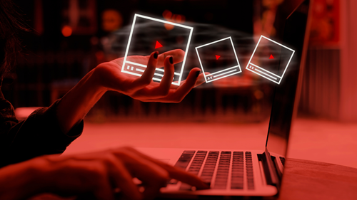 Laptop with video signs.